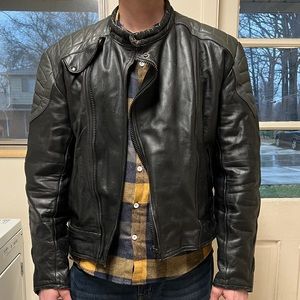 Genuine leather men’s motorcycle jacket with adjustable buckles at the waist